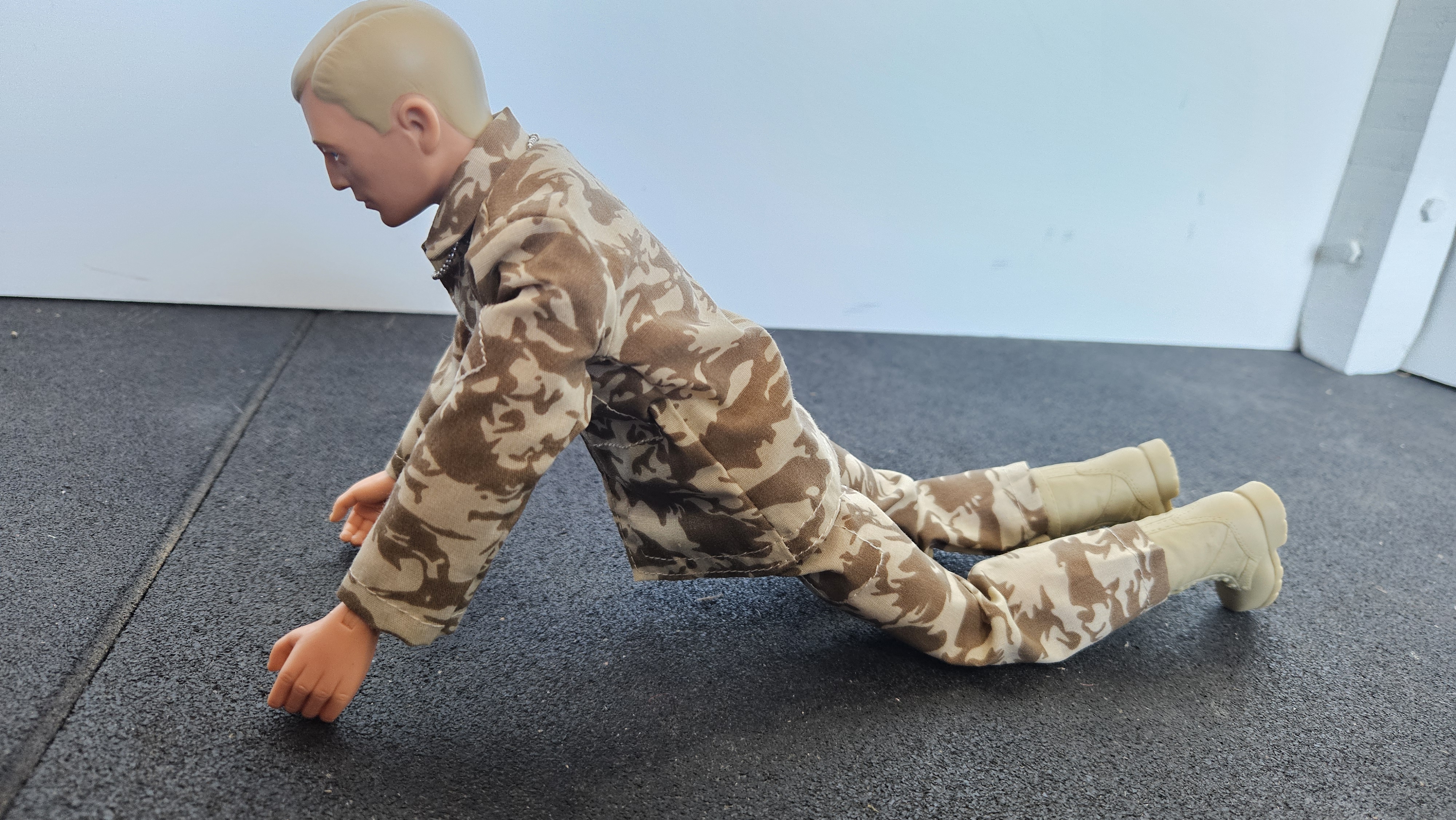 Action Man doing Upward Facing Dog Pose 